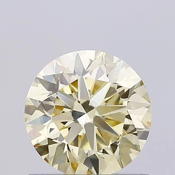 0.79ct Round Lab Grown Diamond (Colour YZ, Clarity VS1, Cut VG, IGI Certified)
